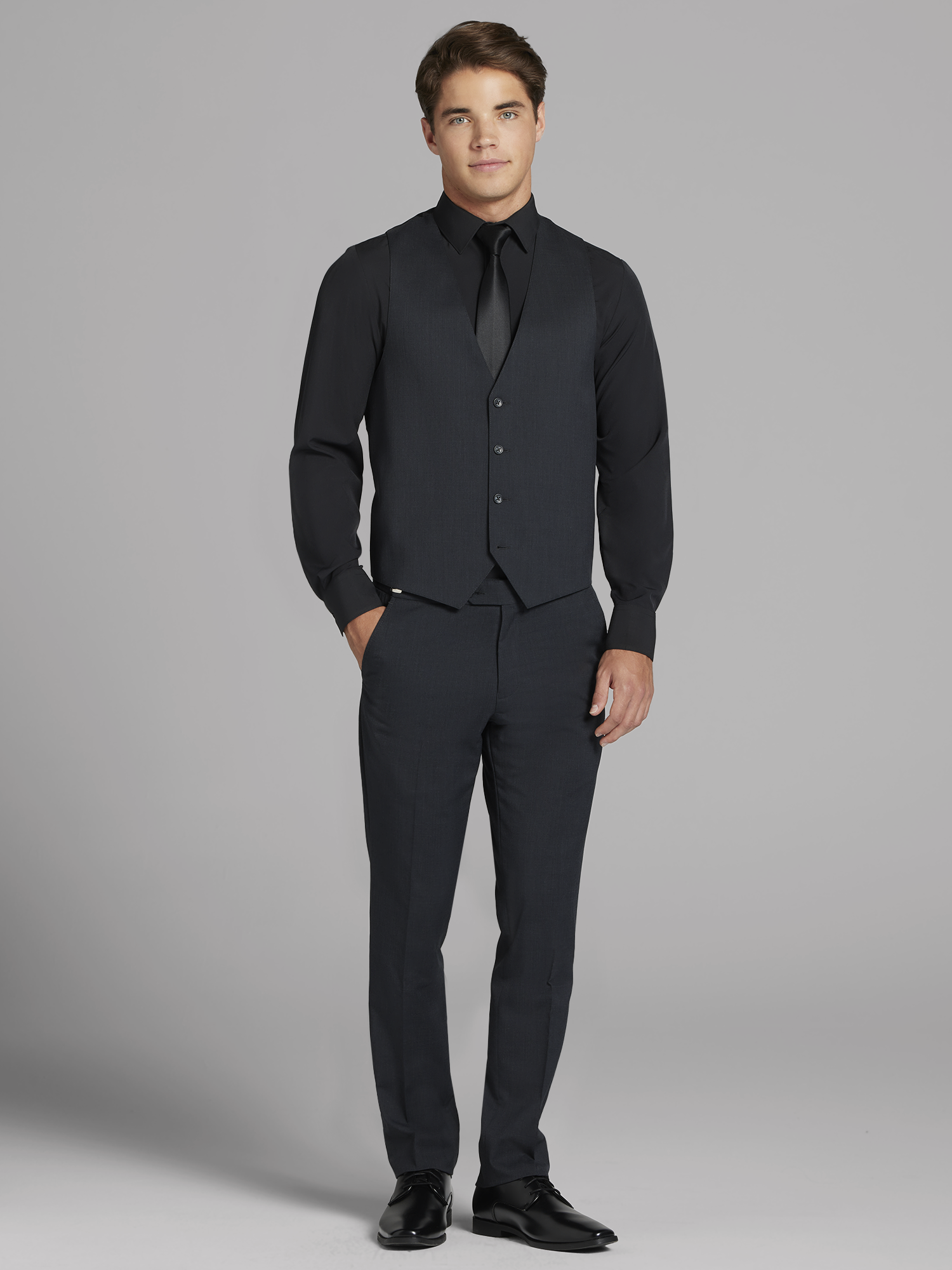Complet Calvin Klein gris fusain en laine haute performance avec revers crantés