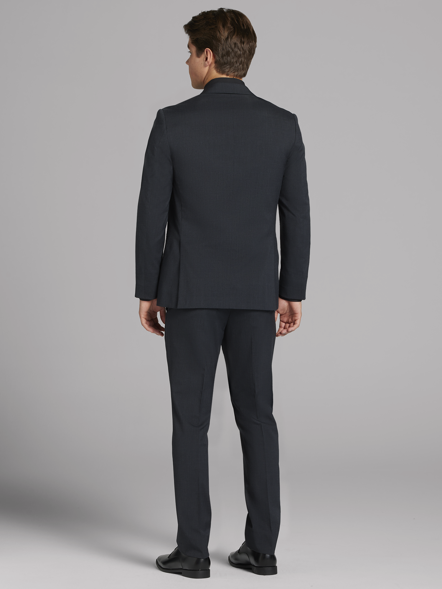 Complet Calvin Klein gris fusain en laine haute performance avec revers crantés